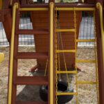 7.4 Jaguar Playcenter w/ BYB Tarp, 4x6 Monkey Bars, Loft, Yellow DoubleWall Scoop Slide and Yellow Spiral Slide